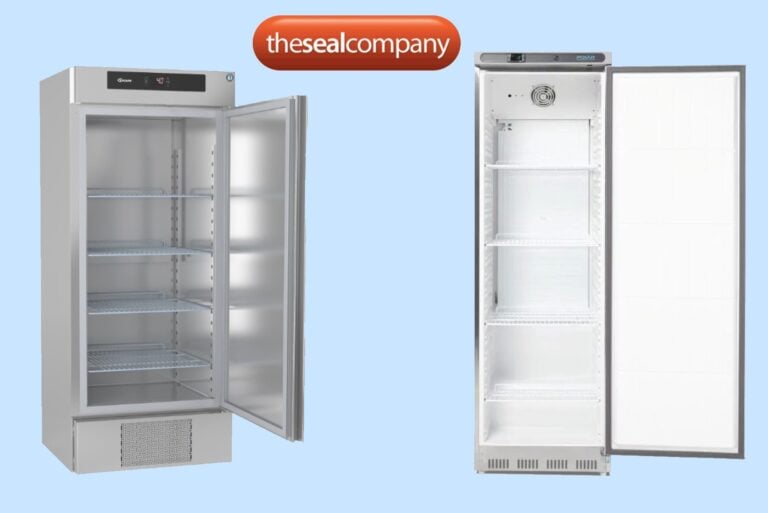 Two upright commercial fridges with glass doors stand open, displaying empty adjustable shelves inside. Above them is an orange oval logo reading “thesealcompany” in white lowercase letters, all set against a light blue background.