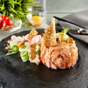 Gourmet Restaurant Food - Delicious Smoked Salmon and Vegetable Salad. Luxury Appetizer Restaurant Food