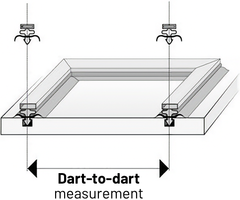 A diagram showing a cross-section of a seal mounted onto a surface. It shows two lines across the two parallel centres of dart seals, with an arrow between the lines to demonstrate the dart-to-dart measurement.